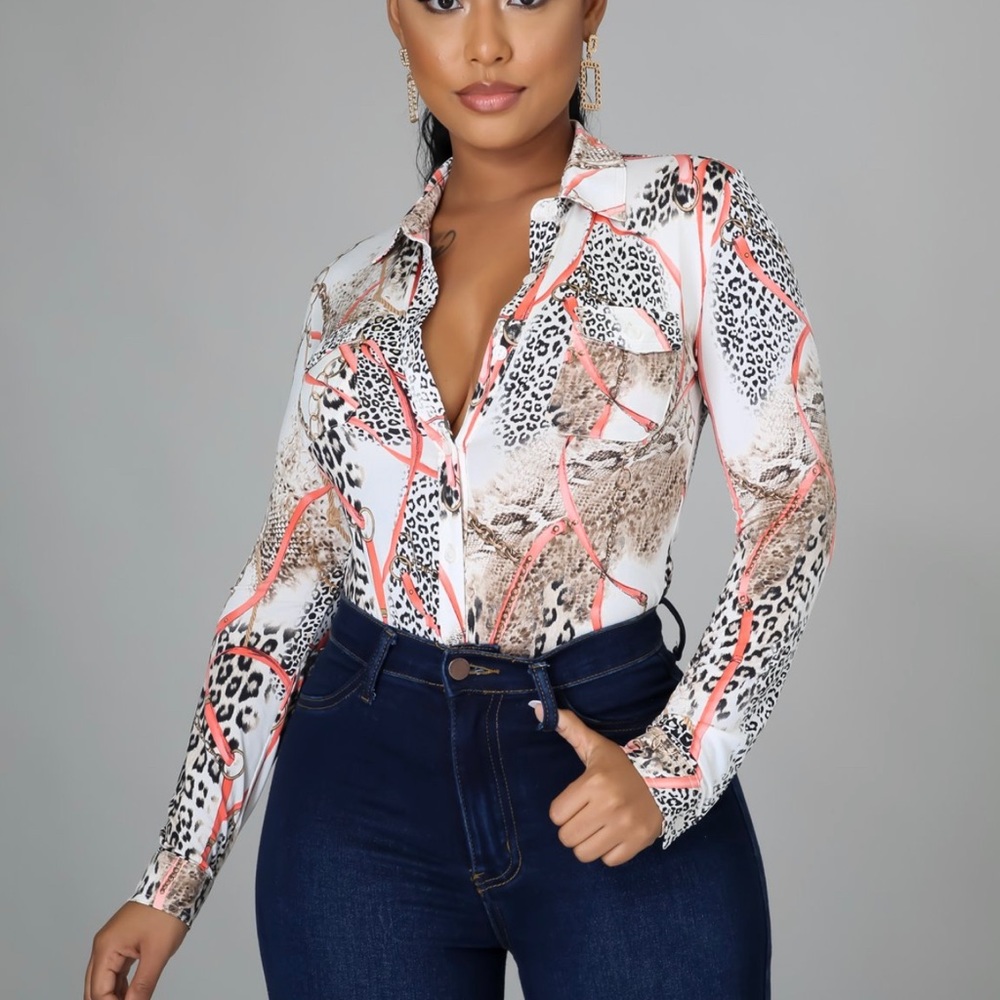 Very stretchy button up blouse very sexy can be worn two different ways.